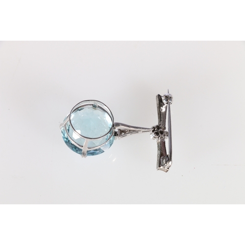 48 - Unhallmarked white metal pendant brooch set with large aquamarine coloured faceted round cut stone a... 