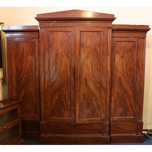 500 - Victorian mahogany breakfront four-door wardrobe with architectural arch pediment above four flame c... 