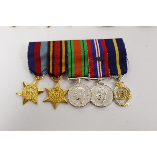 180 - WW II MID group of five. 1939, Burma Stars, War and Defence Medals, Army Emergency Reserve Medal. MI... 