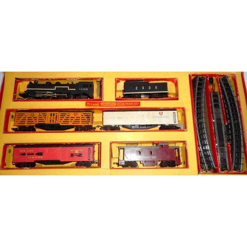 343 - Tri-ang Railways, RS 15 train set with 4-6-0 loco and tender. T.R 2335, black. Boxed.