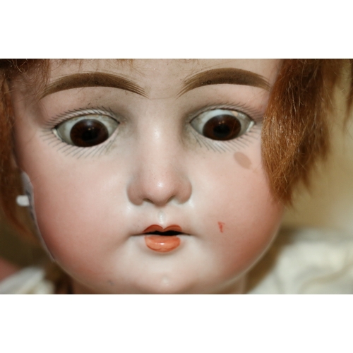 104 - German porcelain bisque head doll, the back of the head marked 