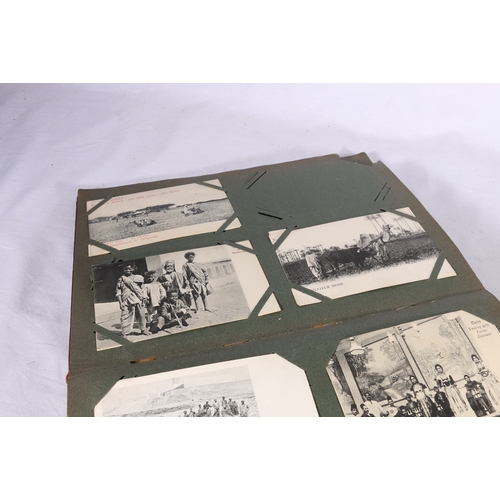 202 - An Edwardian postcard albums containing approximately 270 postcards of African interest including Fe... 