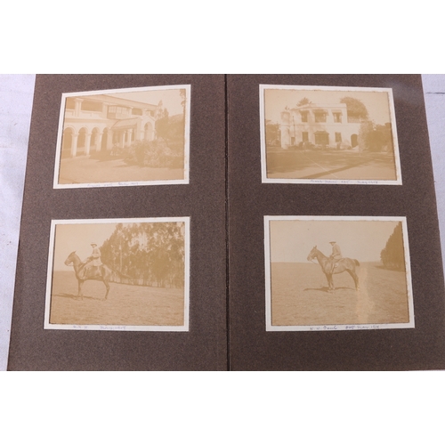 207 - Framed photograph of a Scotsman in Highland dress, four photograph albums containing early motor car... 