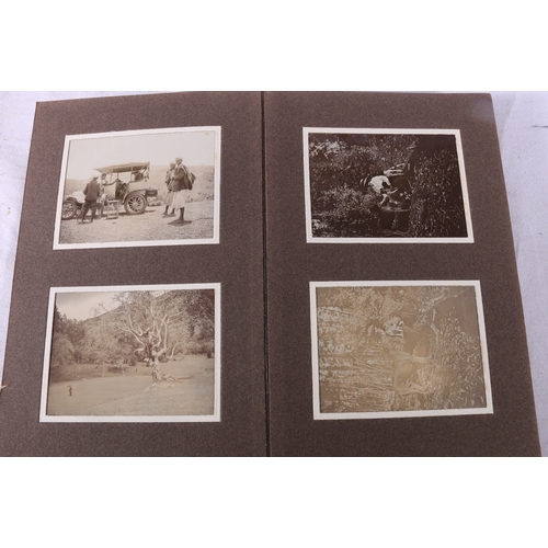 207 - Framed photograph of a Scotsman in Highland dress, four photograph albums containing early motor car... 