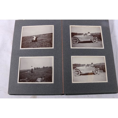 207 - Framed photograph of a Scotsman in Highland dress, four photograph albums containing early motor car... 