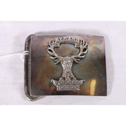 332 - White metal belt buckle of the Gordon Highlanders with By Dand motto and stag by makers Kirkwood of ... 