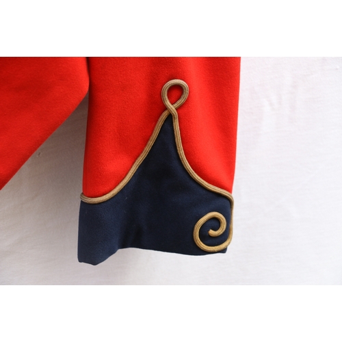 451 - British Army dress uniform scarlet tunic or redcoat with C F Johns and Pegg of London label 