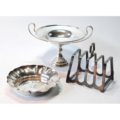 140 - Silver tazza, a fluted dish and a toast rack, 8oz.  (3)