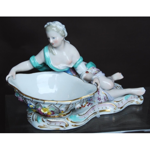 157 - Pair of Meissen sweetmeat dishes in the form of reclining male and female figures in 18th century dr... 