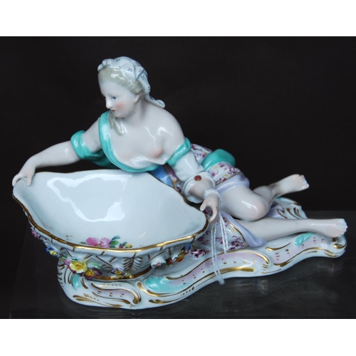 157 - Pair of Meissen sweetmeat dishes in the form of reclining male and female figures in 18th century dr... 