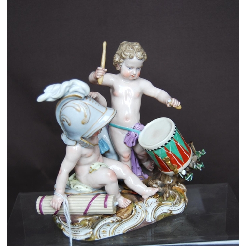 160 - Pair of Meissen figure groups, each of two semi-clad children playing at soldiers, one group with a ... 