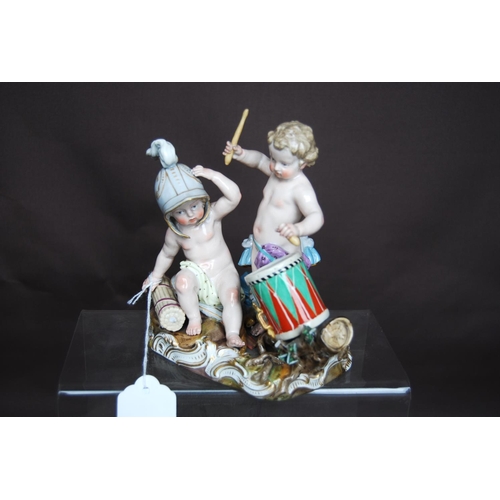 160 - Pair of Meissen figure groups, each of two semi-clad children playing at soldiers, one group with a ... 