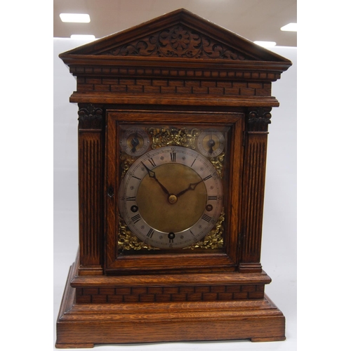 161 - Oak cased Palladian mantel clock with brass face, applied chapter rings and spandrels, Roman and Ara... 