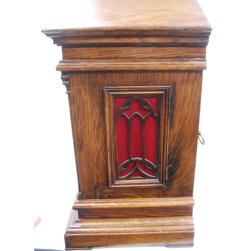 161 - Oak cased Palladian mantel clock with brass face, applied chapter rings and spandrels, Roman and Ara... 