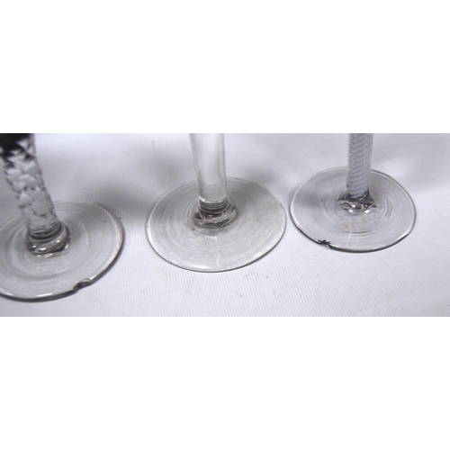 178 - Six assorted wine glasses, two barley twist glasses, one etched with vine leaves, another knop-stemm... 