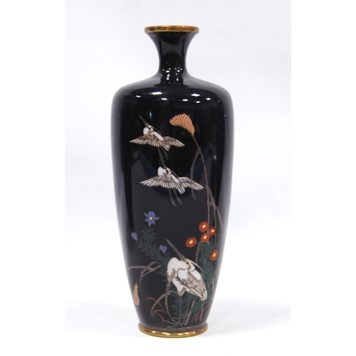 179 - Three cloisonné vases, two with black ground decorated with cranes, the third with green ground, chr... 