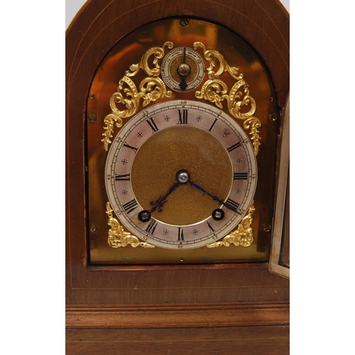 187 - Mantel clock by Winterhalder & Hofmeier, quarter chiming, with brass and silvered dial in mahoga... 