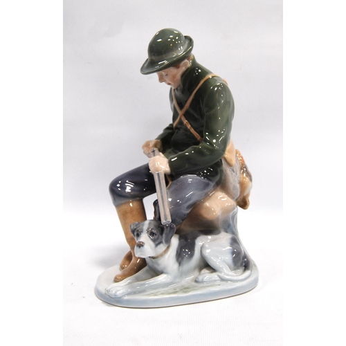 190 - Royal Copenhagen figure of a gentleman with shotgun in hand, 21cm high.