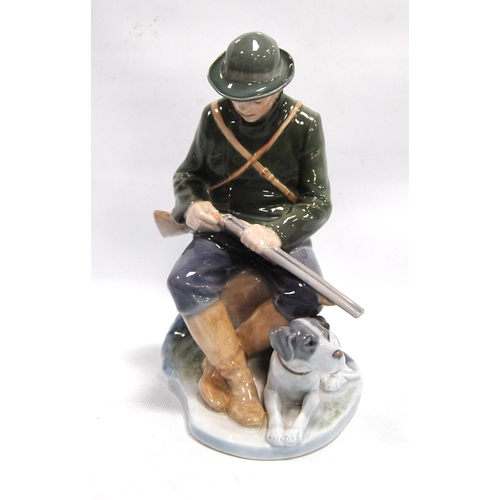 190 - Royal Copenhagen figure of a gentleman with shotgun in hand, 21cm high.