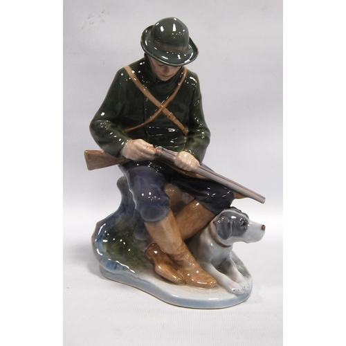 190 - Royal Copenhagen figure of a gentleman with shotgun in hand, 21cm high.