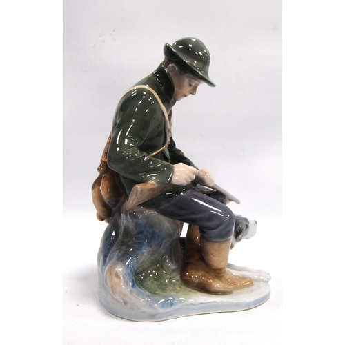 190 - Royal Copenhagen figure of a gentleman with shotgun in hand, 21cm high.