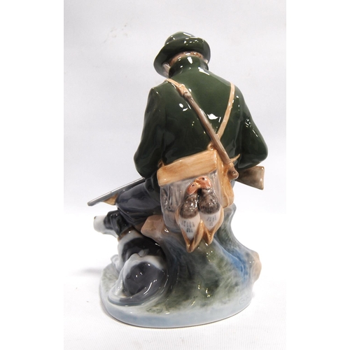 190 - Royal Copenhagen figure of a gentleman with shotgun in hand, 21cm high.