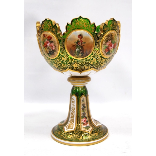 198 - Victorian green glass vase with shaped rim over painted panels and gilt floral decoration, 20cm high... 