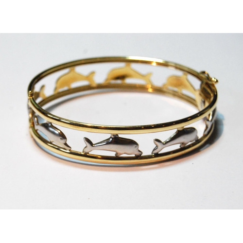 20 - Coloured gold openwork hinged bangle with leaping dolphins, '585', 20g.
