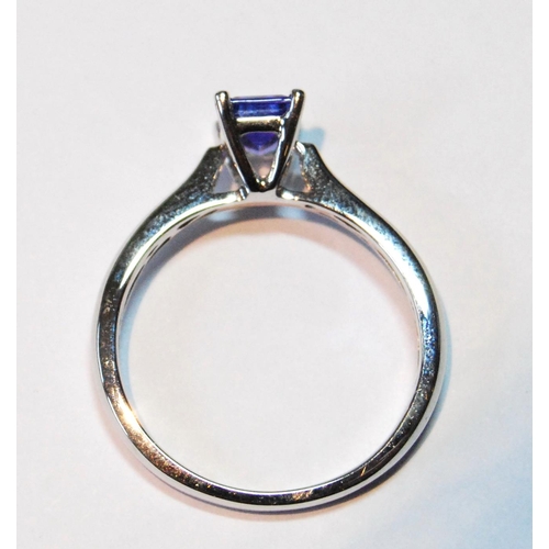 26 - Tanzanite ring, rectangular stone, in platinum, size Q.