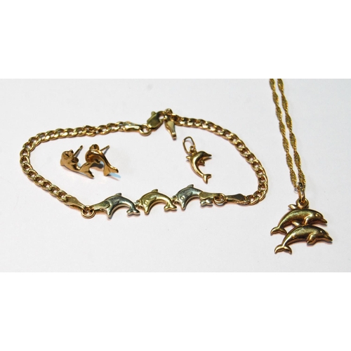 32 - 9ct gold bracelet with dolphins, two similar pendants and a pair of earrings, 5.4g.
