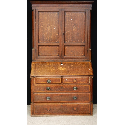 349 - George III oak bureau bookcase, the projected moulded cornice over shell inlaid panelled doors flank... 