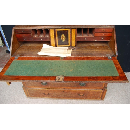 349 - George III oak bureau bookcase, the projected moulded cornice over shell inlaid panelled doors flank... 