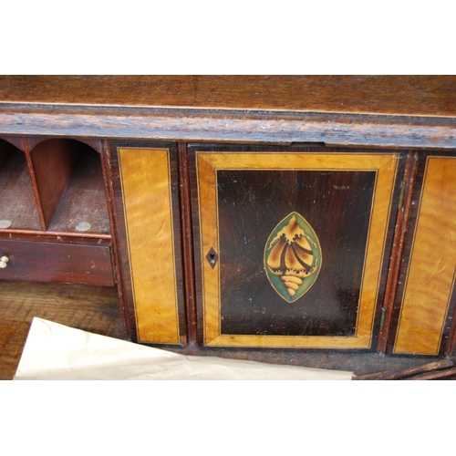 349 - George III oak bureau bookcase, the projected moulded cornice over shell inlaid panelled doors flank... 