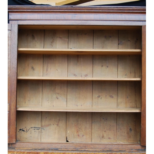 349 - George III oak bureau bookcase, the projected moulded cornice over shell inlaid panelled doors flank... 