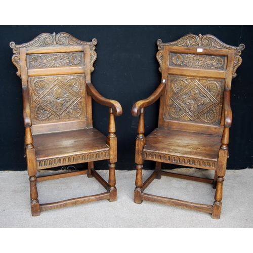 352 - Pair of 19th century carved oak armchairs, each with acanthus serpentine pediment over panelled back... 