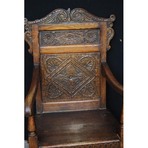 352 - Pair of 19th century carved oak armchairs, each with acanthus serpentine pediment over panelled back... 