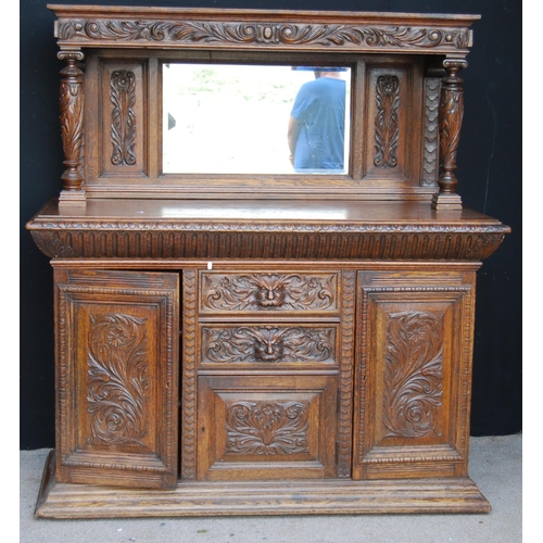 353 - Large late Victorian oak sideboard, the projected moulded cornice over carved frieze, mirrored back ... 