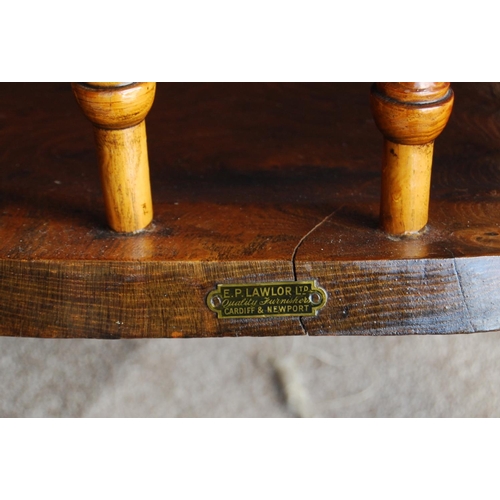 366 - Yew wood captain's chair of typical form with turned splats and legs, label verso for E.P. Lawlor Lt... 