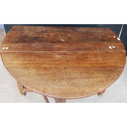 368 - Oak gateleg table, the oval top raised on block and baluster turned legs united by stretcher, 119cm ... 