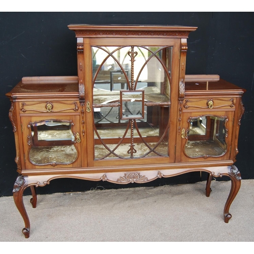 369 - Late 19th century mahogany display cabinet, the projected cornice over stepped top, glazed door encl... 