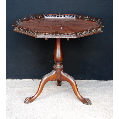 374 - Mahogany Chinese Chippendale style tea table, the octagonal top with pierced fretwork, raised on bal... 