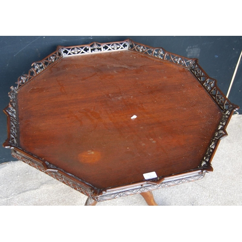 374 - Mahogany Chinese Chippendale style tea table, the octagonal top with pierced fretwork, raised on bal... 