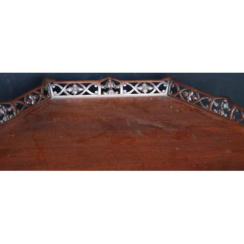 374 - Mahogany Chinese Chippendale style tea table, the octagonal top with pierced fretwork, raised on bal... 