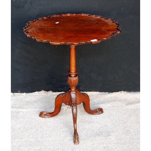 375 - Mahogany piecrust table with tilt top raised on turned supports, acanthus carved cabriole legs termi... 