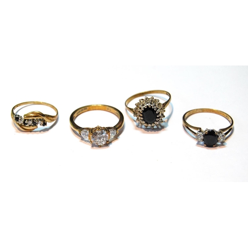 38 - Cubic zirconia three-stone ring and three others, 9ct gold, 7.9g.