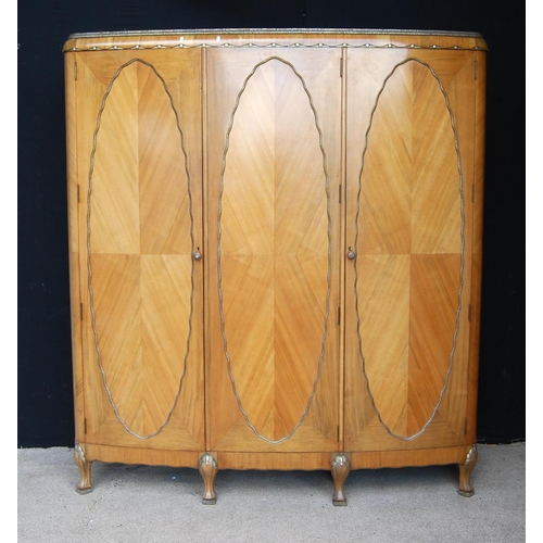 385 - Art Nouveau walnut bedroom suite comprising of a three-door wardrobe, pair of single beds, dressing ... 