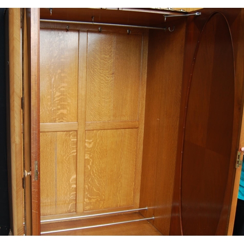 385 - Art Nouveau walnut bedroom suite comprising of a three-door wardrobe, pair of single beds, dressing ... 