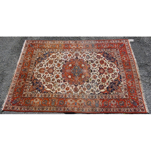 395 - Persian rug with central medallion, all over floral design, cream ground, spandrels and triple borde... 