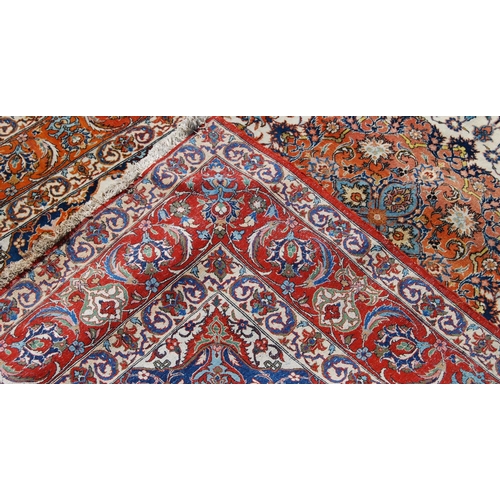 395 - Persian rug with central medallion, all over floral design, cream ground, spandrels and triple borde... 