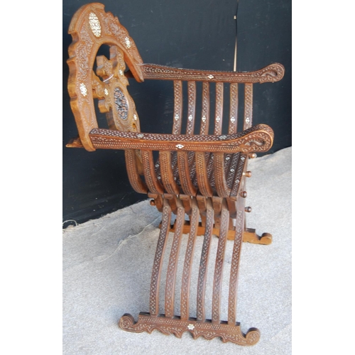 397 - Late Victorian Syrian Savonarola chair, the elaborate carved back with turned centre, the whole inla... 